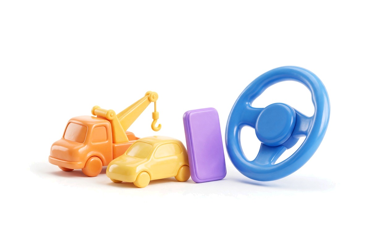 Orange tow truck, yellow car, purple smartphone and blue steering wheel