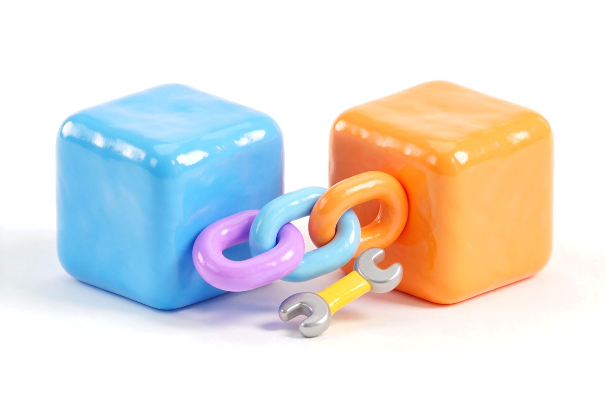 Chunky chain links joining two cubes, with a small wrench beside them