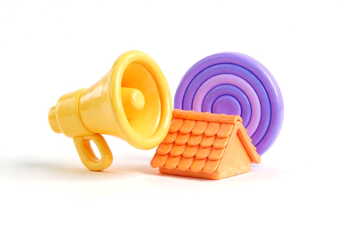Yellow megaphone aimed at a small tiled roof in front of a purple target ring