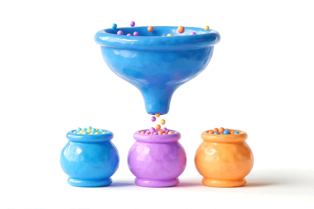 Funnel sorting coloured balls into three matching jars in a row