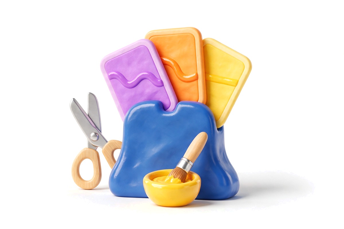 Stand of three fanned cards with scissors and a hair colour bowl and brush