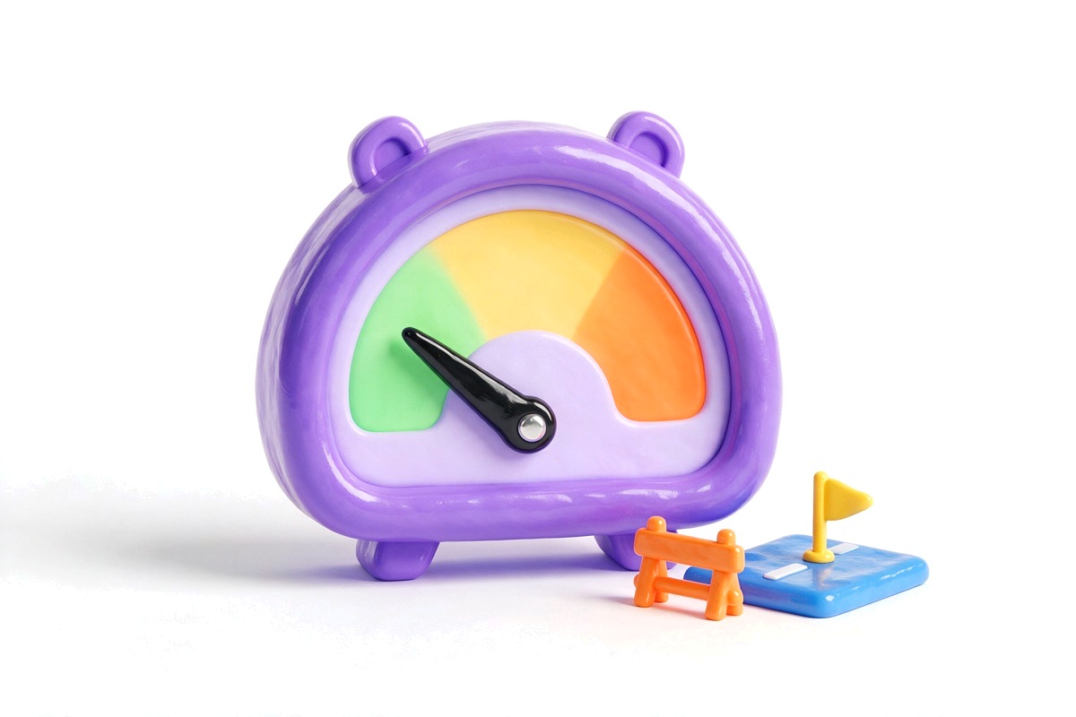 Purple dial gauge in the green zone, a road tile with flag, and a barrier