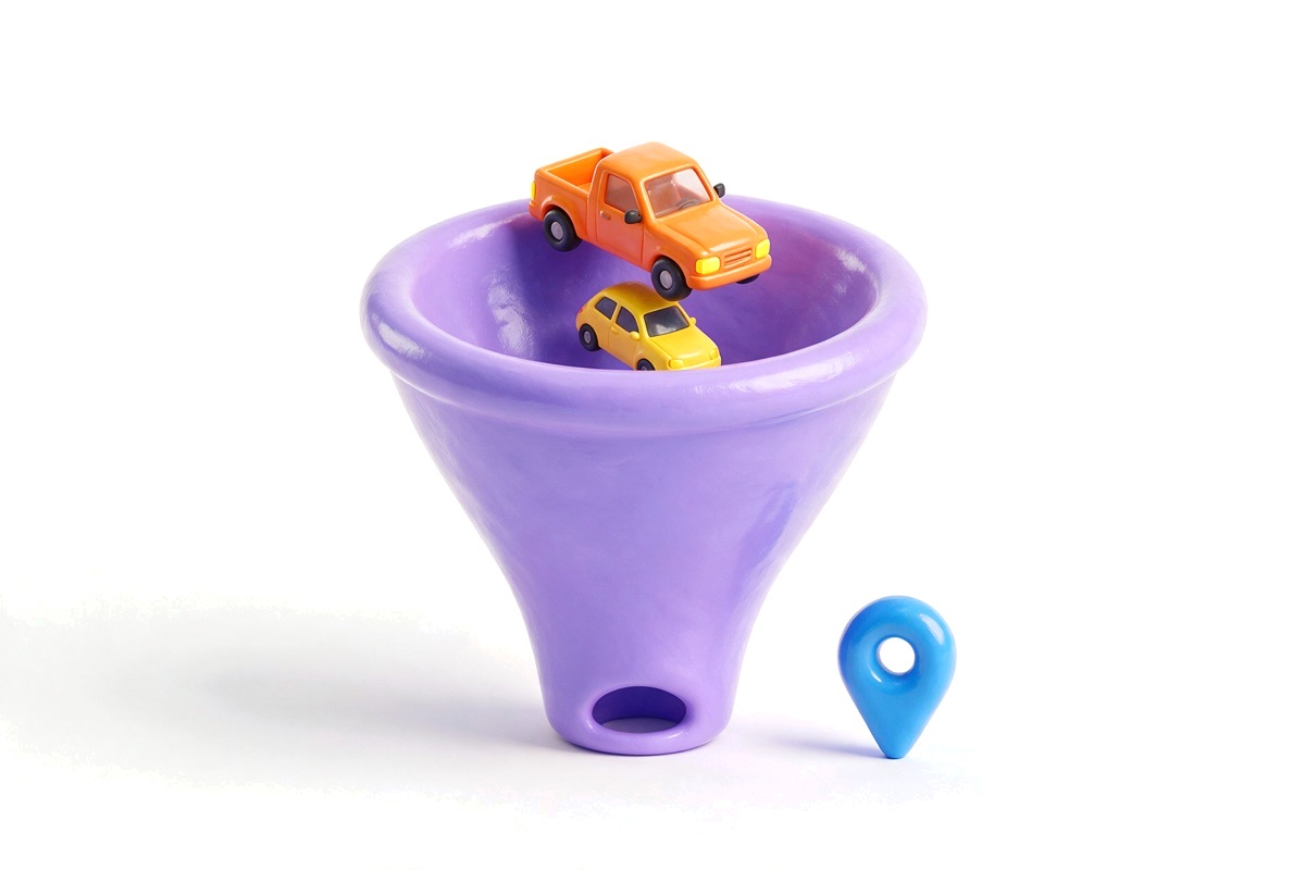 Purple funnel sorting small orange pickup and yellow car, with blue pin