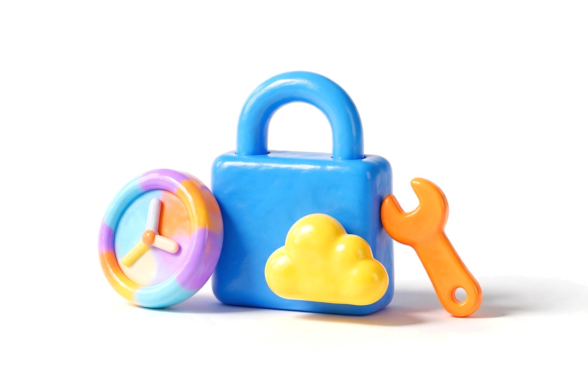 Padlock beside a clock, a wrench and a small backup disc
